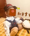 过新年穿新衣戴新帽